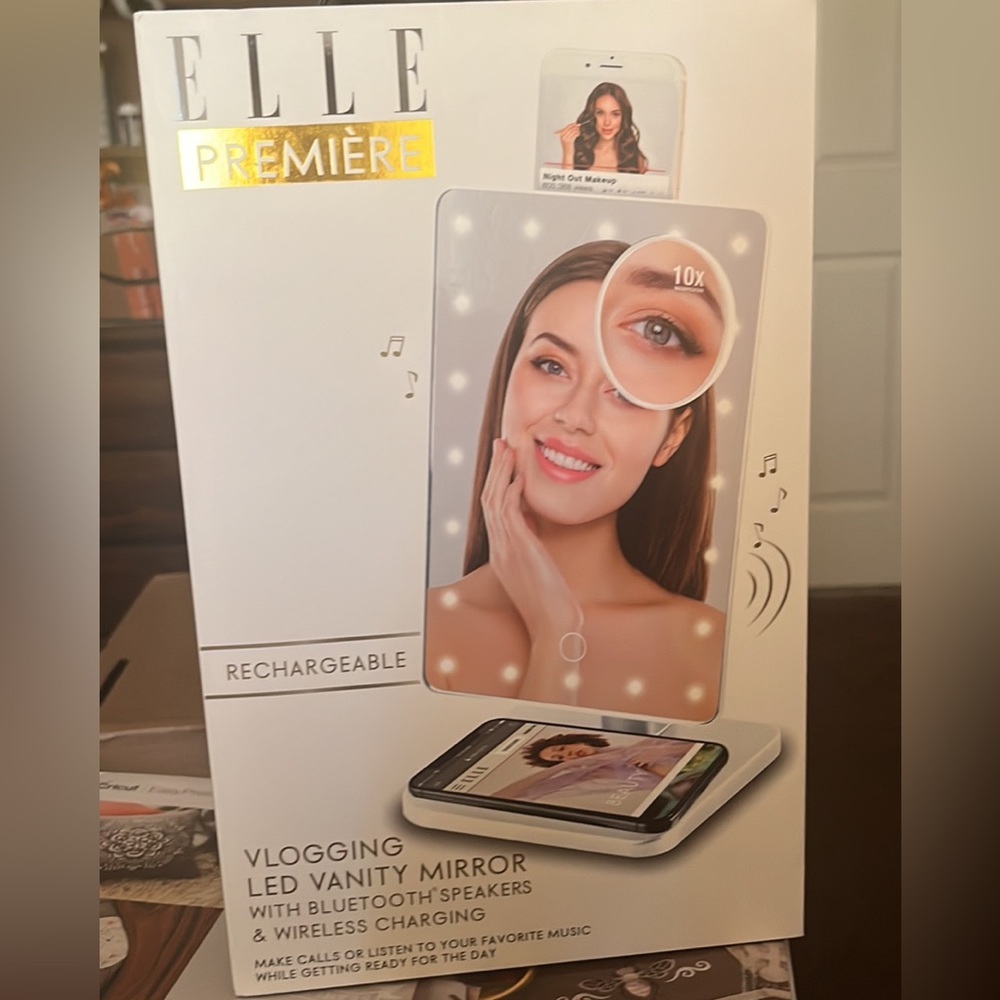 Brand new in box makeup mirror with lights. U can also charge ur phone